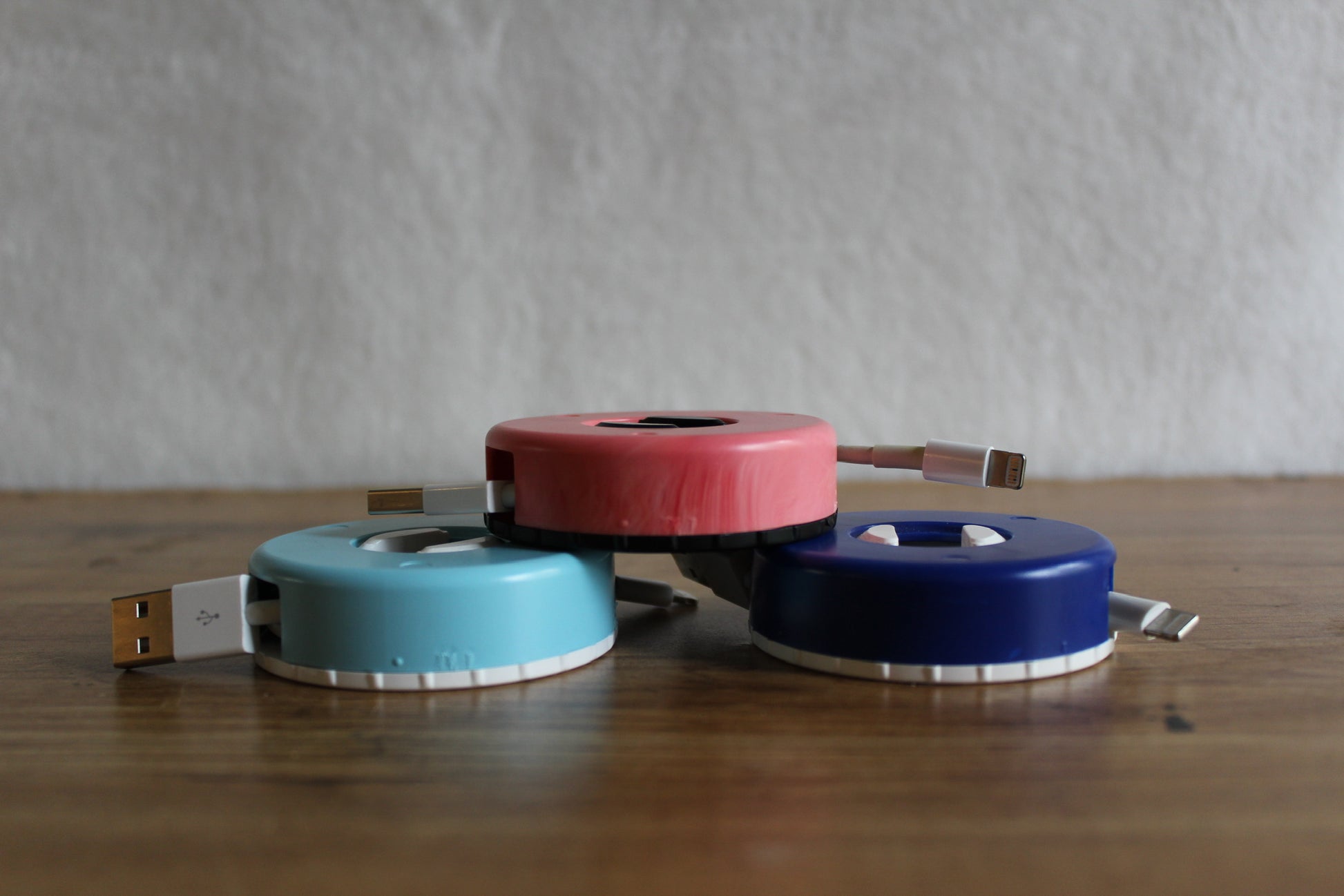 Customized CordPucks, the ultimate cord storage device